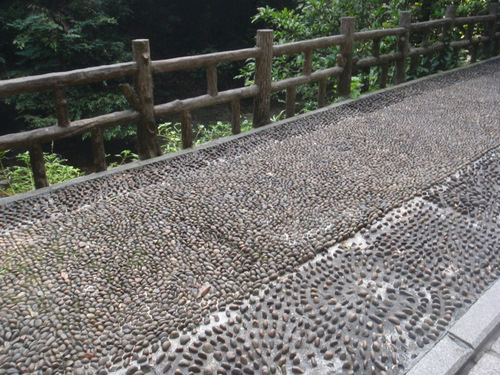 Walkway along the creek, leading to the Temple.